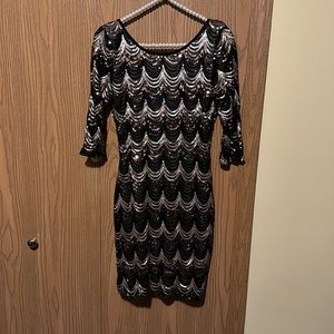 Beautiful shades of gold and black design sequin dress